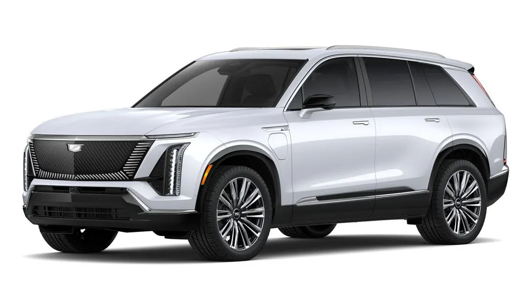 A white 2027 Cadillac Vistiq three-row electric SUV on a plain white background, seen from the front three-quarter angle